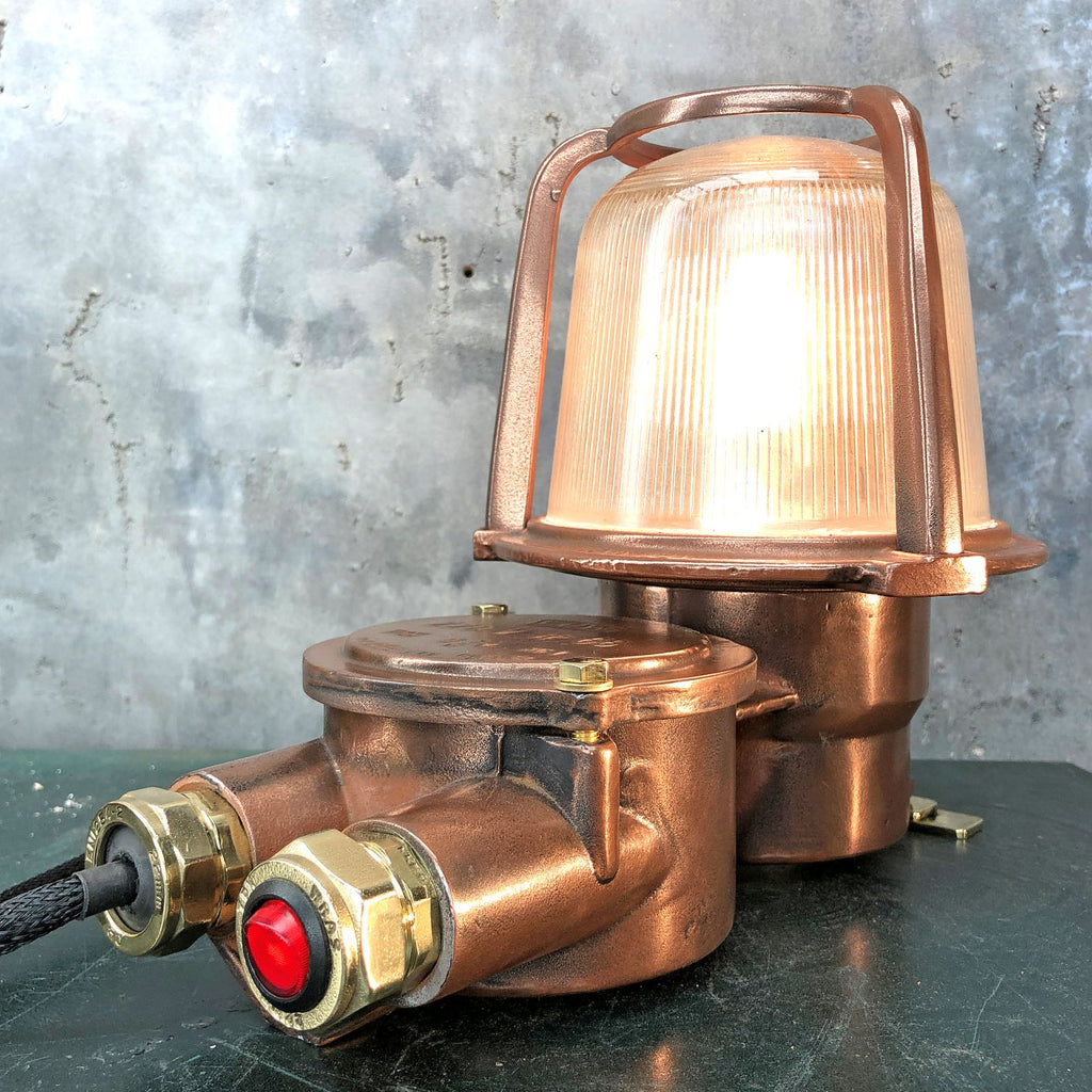 A reclaimed industrial 1970's copper and brass table lamp converted from an old bulkhead lamp by EOW.