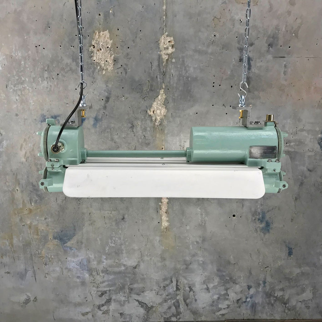 Retro industrial ceiling striplight painted duck egg green with energy saving LED tubes.
