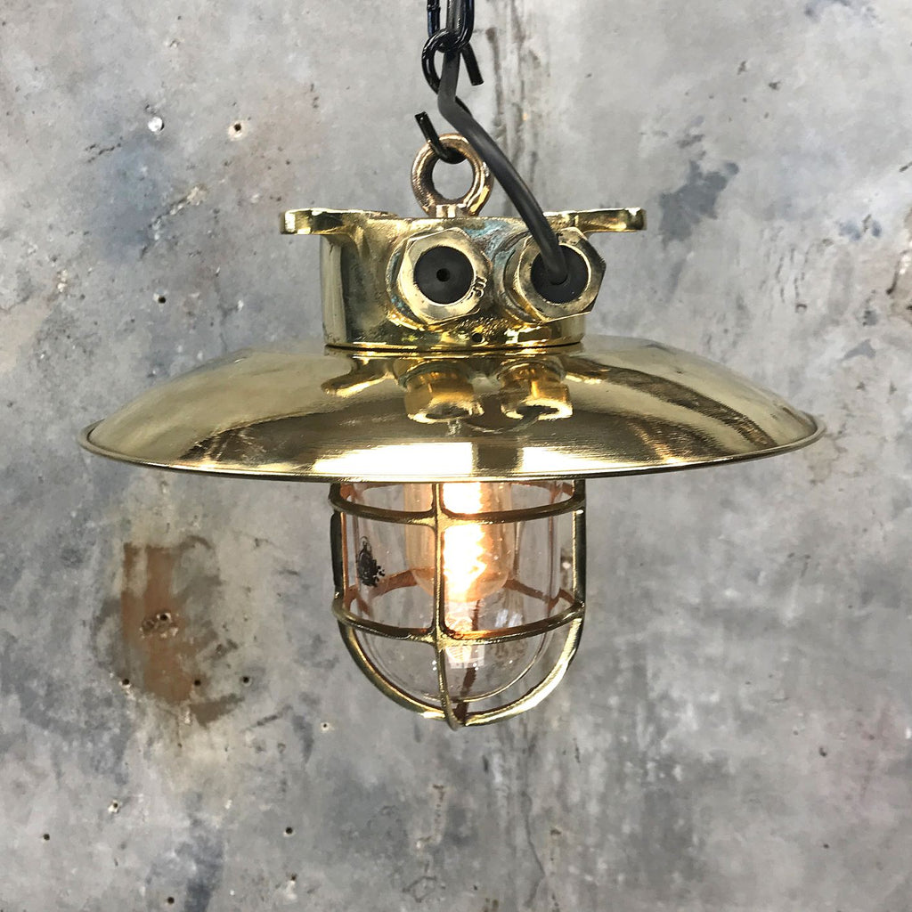 Explosion proof brass cage light. Reclaimed industrial lighting