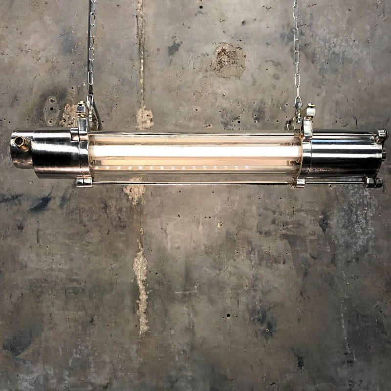 A vintage industrial aluminium flameproof ceiling strip light fitted with T8 LED tubes. 