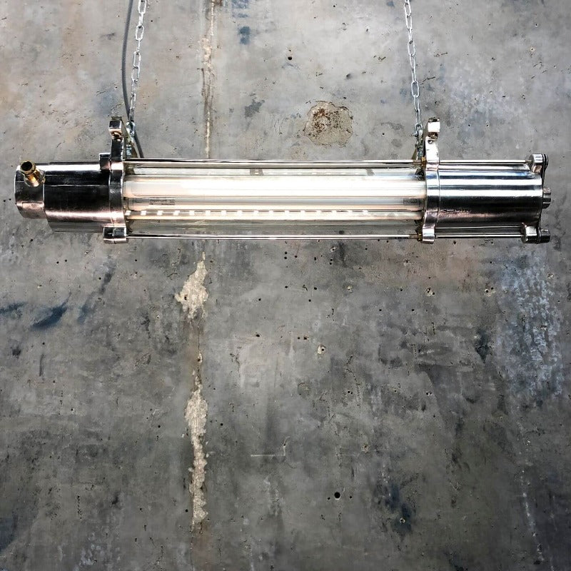 A vintage industrial aluminium flameproof ceiling strip light fitted with T8 LED tubes. 