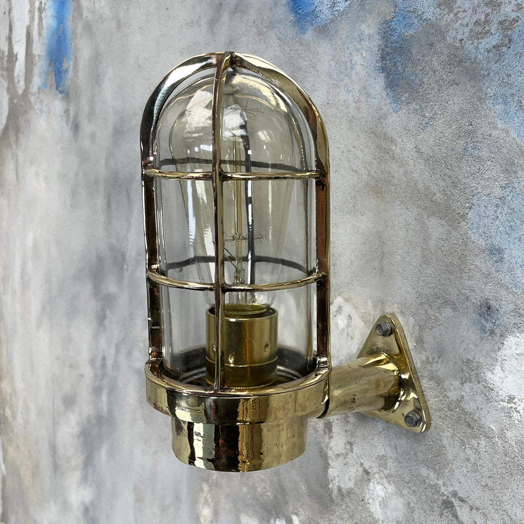 Vintage industrial cast brass 90 degree wall cage light by Industria Rotterdam.
