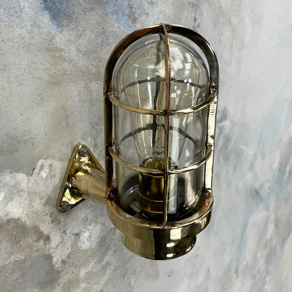 Vintage industrial cast brass 90 degree wall cage light by Industria Rotterdam.