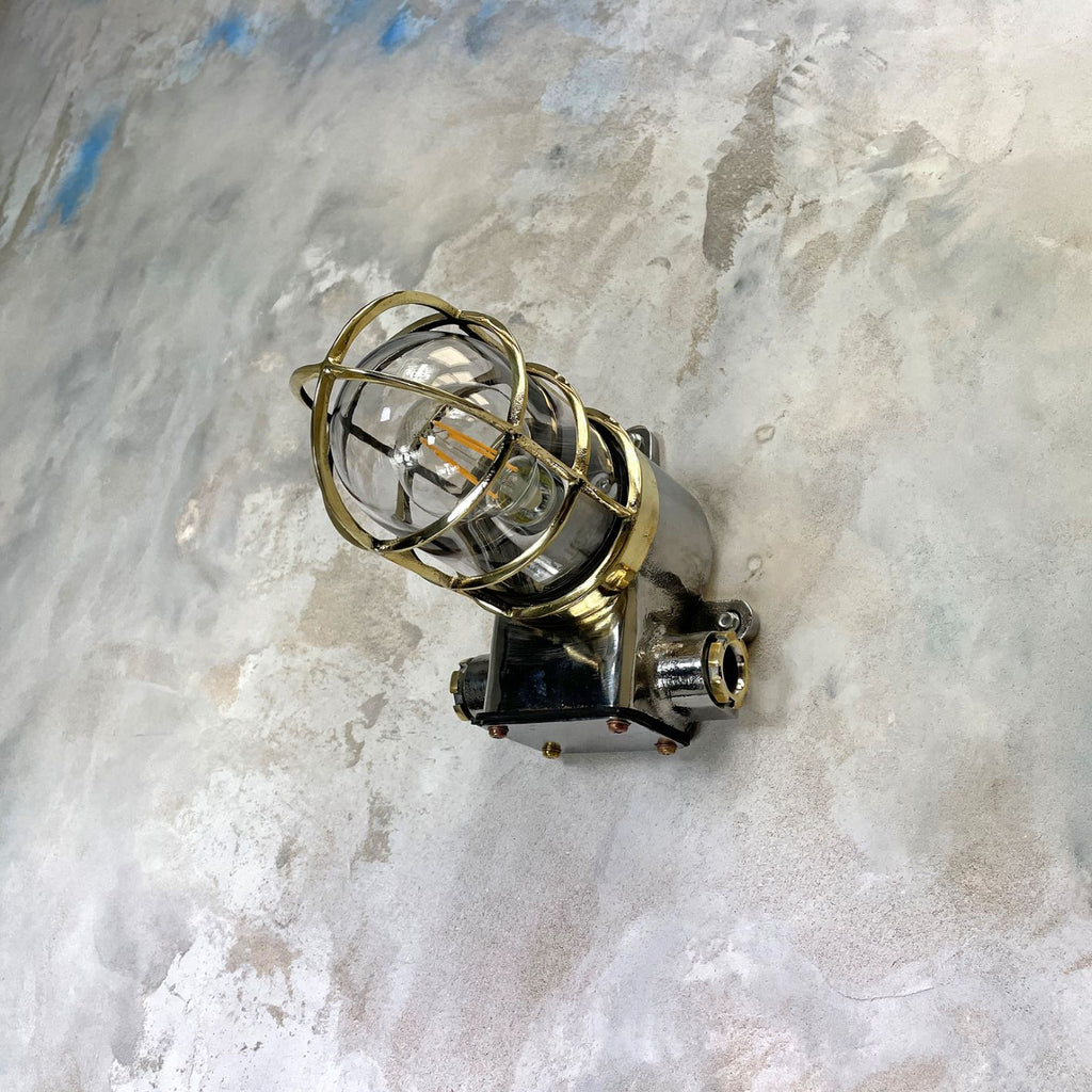 Vintage industrial cage wall light in brass & iron by Kokosha. Original restored lighting for modern interiors. Compatible with LED light bulbs.