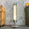 Industrial style floor lamp with cage. Reclaimed vintage which has been professionally restored. 