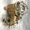 Vintage industrial small cage light in bronze by Kokosha. Restored for indoor use for ultimate industrial style.