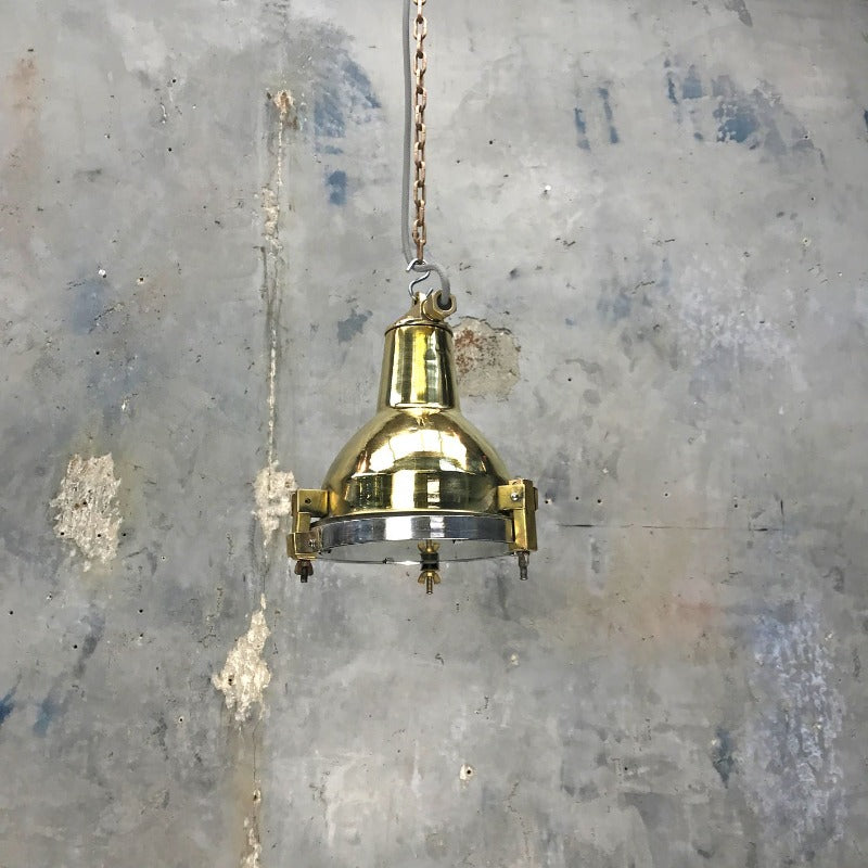 A small reclaimed vintage industrial brass spot light ceiling pendant