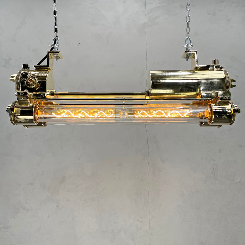Vintage industrial brass Edison LED tube ceiling strip light made by Daeyang in the 1970's. Originally nautical ceiling light fixtures from old ships, we have rewired these unique flameproof strip lights and given them a modern restoration making them fantastic feature lighting to inject some industrial style into any contemporary interior.