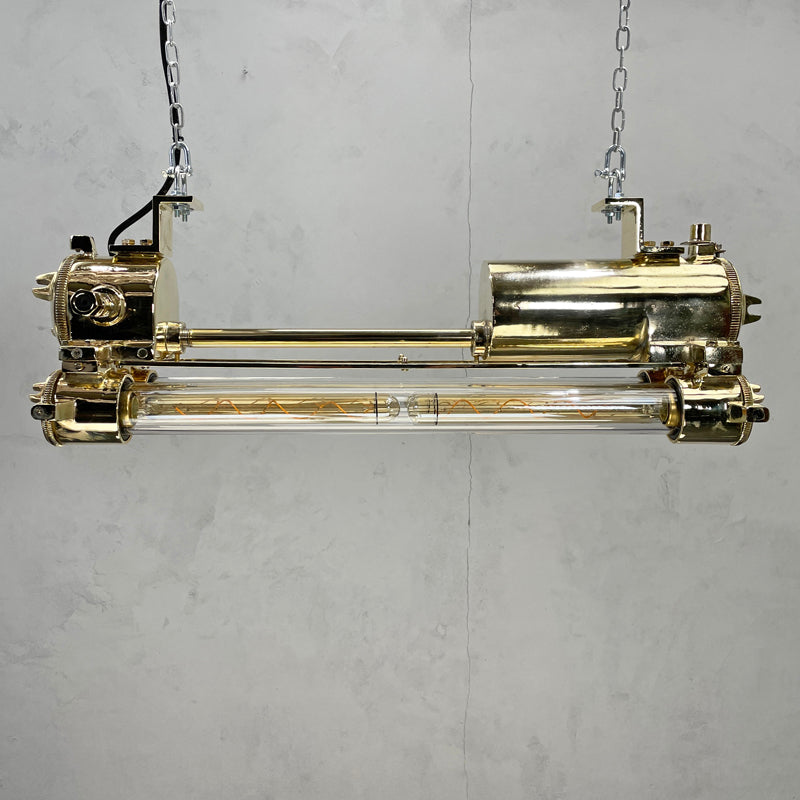 Vintage industrial brass Edison LED tube ceiling strip light made by Daeyang in the 1970's. Originally nautical ceiling light fixtures from old ships, we have rewired these unique flameproof strip lights and given them a modern restoration making them fantastic feature lighting to inject some industrial style into any contemporary interior.