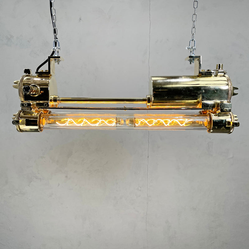 Vintage industrial brass Edison LED flameproof tube ceiling strip light made by Daeyang in the 1970's. Originally nautical ceiling light fixtures from old ships, we have rewired these unique reclaimed strip lights and given them a modern restoration making them fantastic feature lighting to inject some industrial style into any contemporary interior.