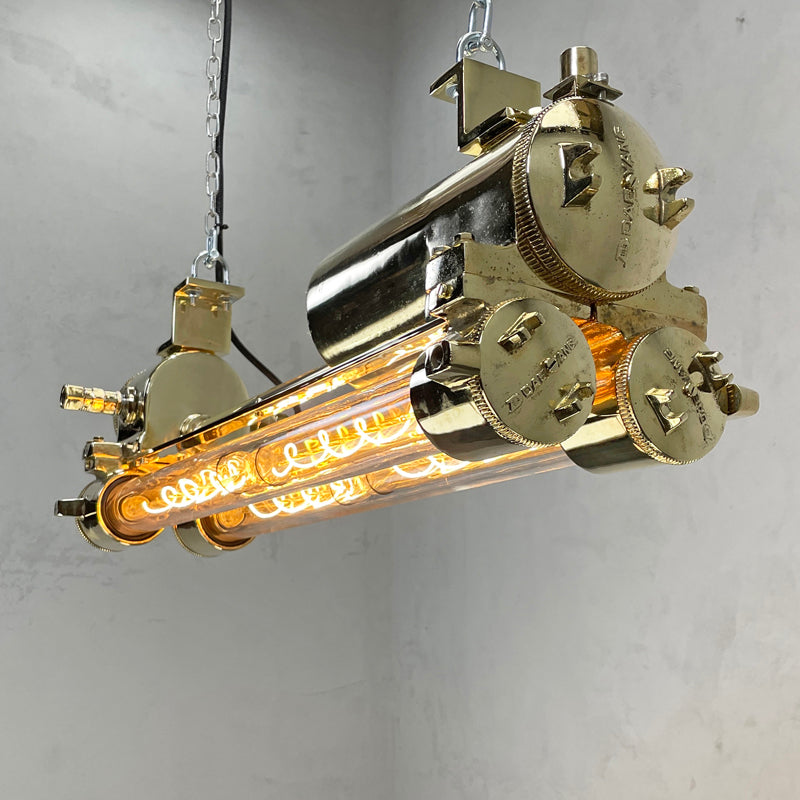 Vintage industrial brass Edison LED flameproof tube ceiling strip light made by Daeyang in the 1970's. Originally nautical ceiling light fixtures from old ships, we have rewired these unique reclaimed strip lights and given them a modern restoration making them fantastic feature lighting to inject some industrial style into any contemporary interior.