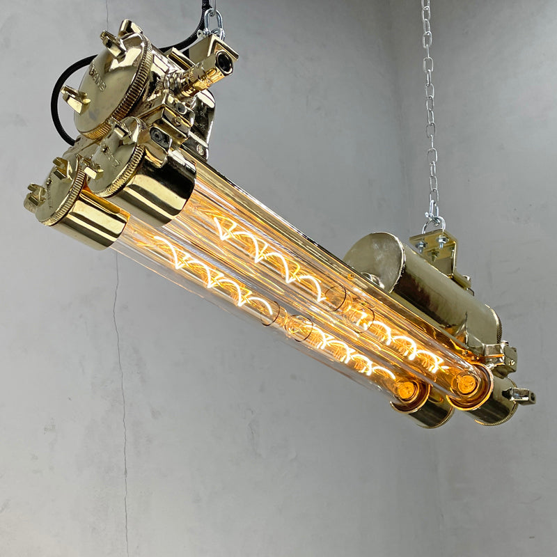 Vintage industrial brass Edison LED flameproof tube ceiling strip light made by Daeyang in the 1970's. Originally nautical ceiling light fixtures from old ships, we have rewired these unique reclaimed strip lights and given them a modern restoration making them fantastic feature lighting to inject some industrial style into any contemporary interior.