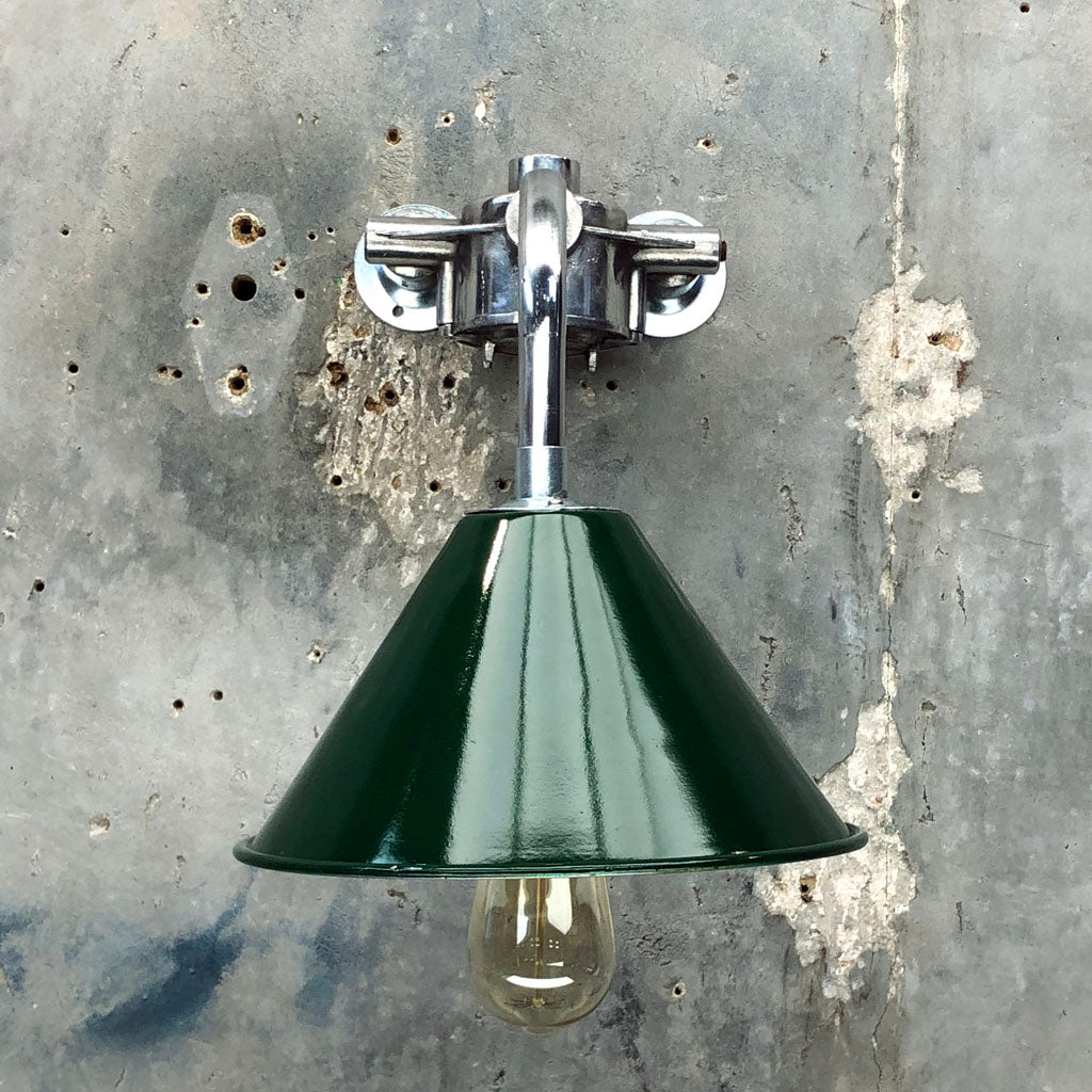 Vintage wall lighting with British military green festoon shade fitted to a bespoke galvanised steel cantilever wall fixture. 