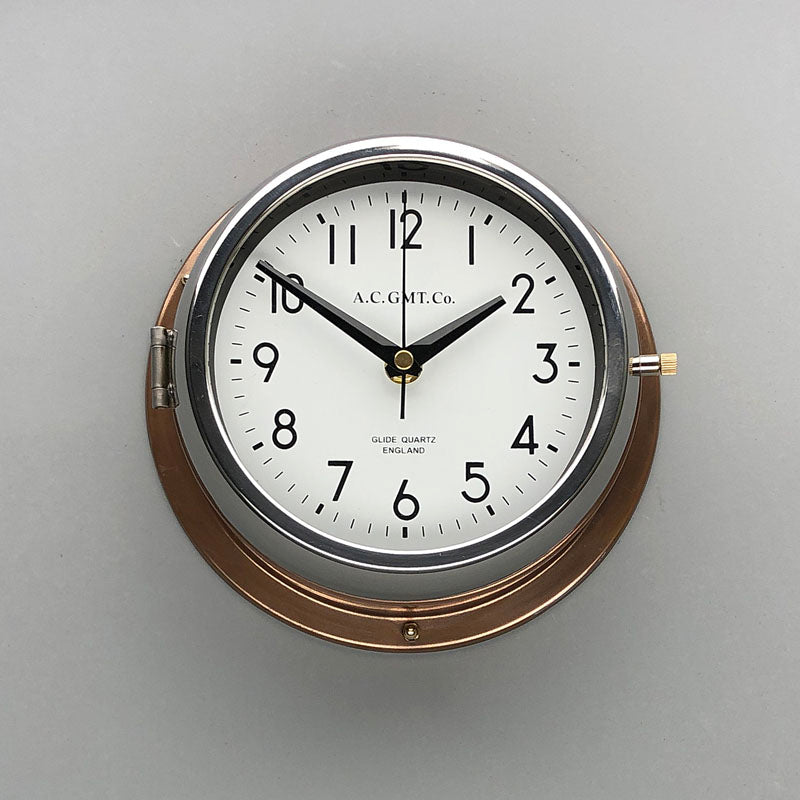 A silent wall clock reclaimed and refurbished. This round copper wall clock is ideal for a peaceful day if you want a non-ticking clock!
