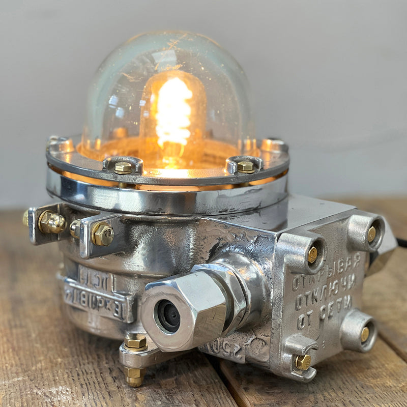 Eastern Bloc nautical aluminium table lamp reclaimed from decommissioned 1980's cargo ships. Professionally restored and rewired by hand in our workshop, ready to be reused in modern interiors or outdoor living spaces. 