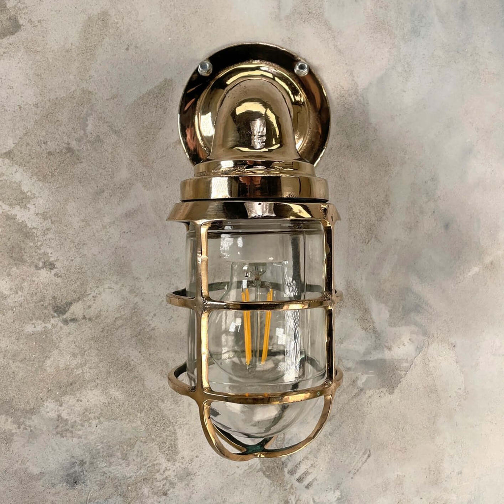 Outdoor vintage wall light made by Crouse Hinds using Bronze and glass. A highly robust vintage industrial outdoor wall sconce for all weathers