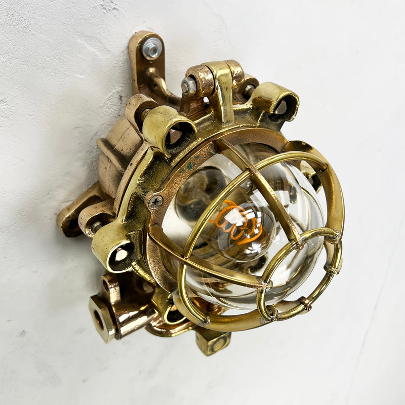 Vintage industrial bronze and brass flameproof wall cage light manufactured by Morio Denki 