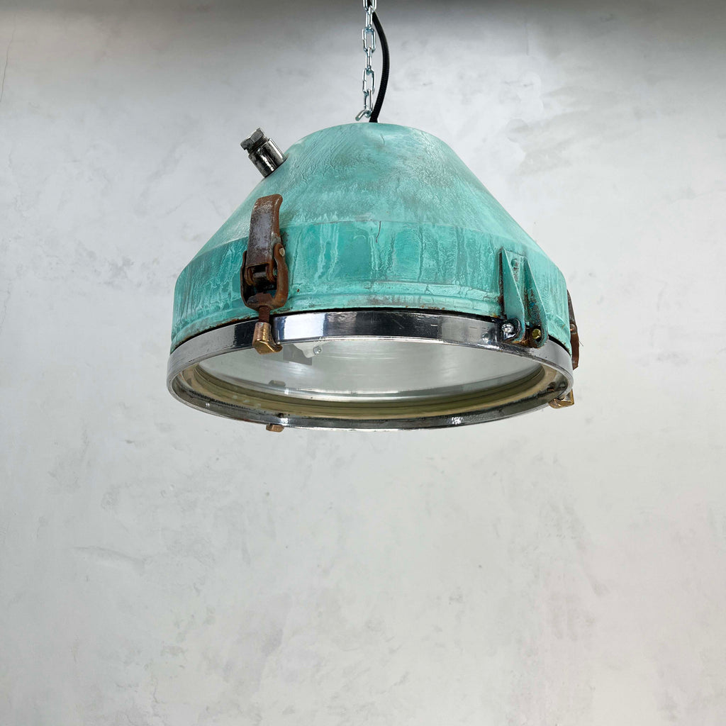 a vintage industrial bespoke verdigris pendant light by Loomlight. reclaimed and professionally refurbished. Unique vintage industrial lighting.