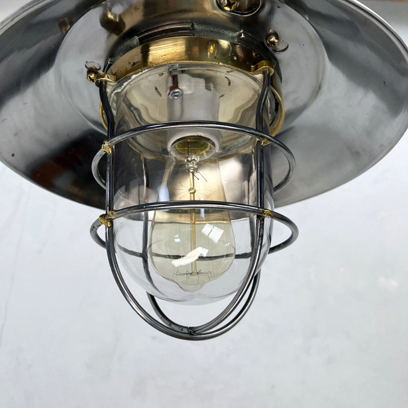 A vintage industrial cast steel explosion proof ceiling cage pendant light. Originating from Osaka Japan manufactured by Kokosha c1980.