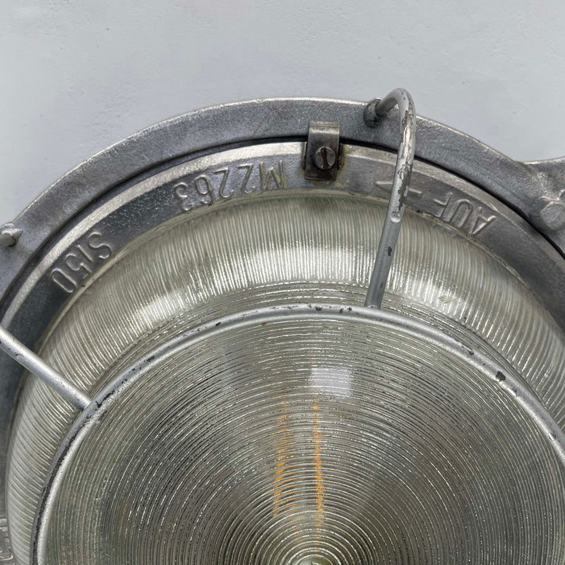 Vintage cast aluminium circular bulkhead or ceiling light with diffusion glass, made in GDR by EOW in the 1970's.