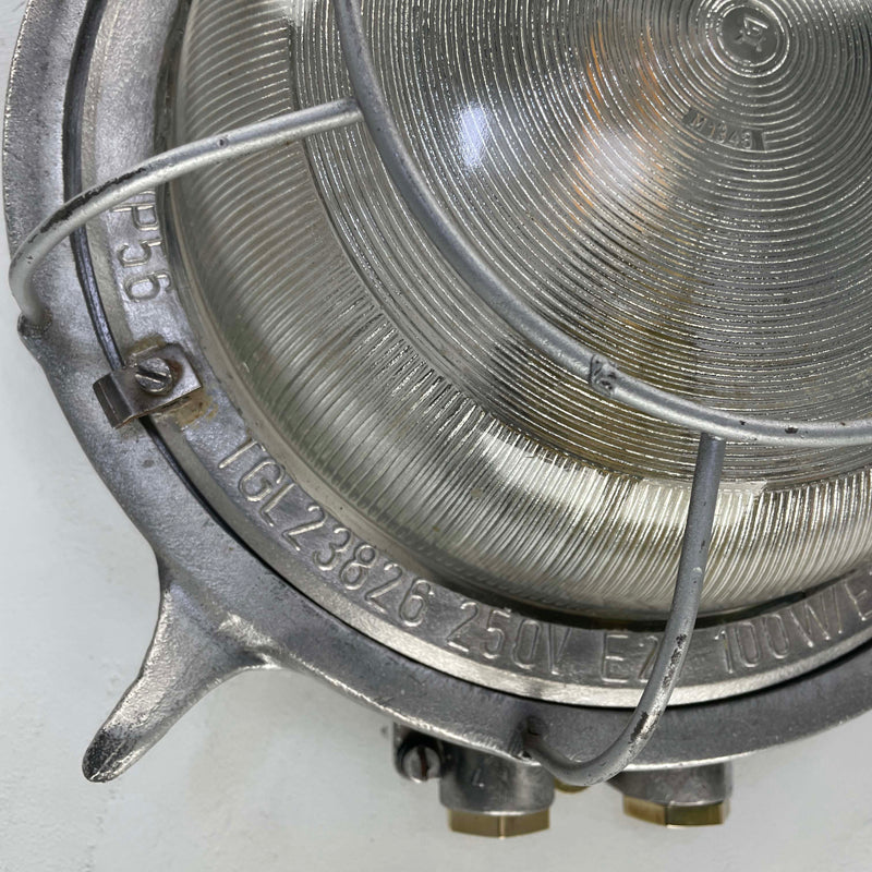Vintage cast aluminium circular bulkhead or ceiling light with diffusion glass, made in GDR by EOW in the 1970's.