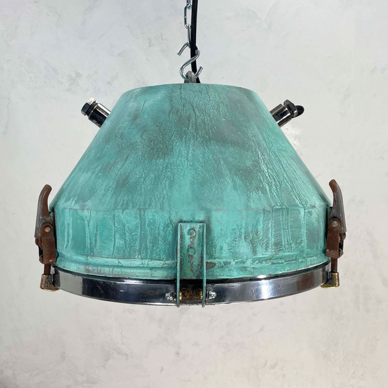 a vintage industrial bespoke verdigris pendant light by Loomlight. reclaimed and professionally refurbished. Unique vintage industrial lighting.