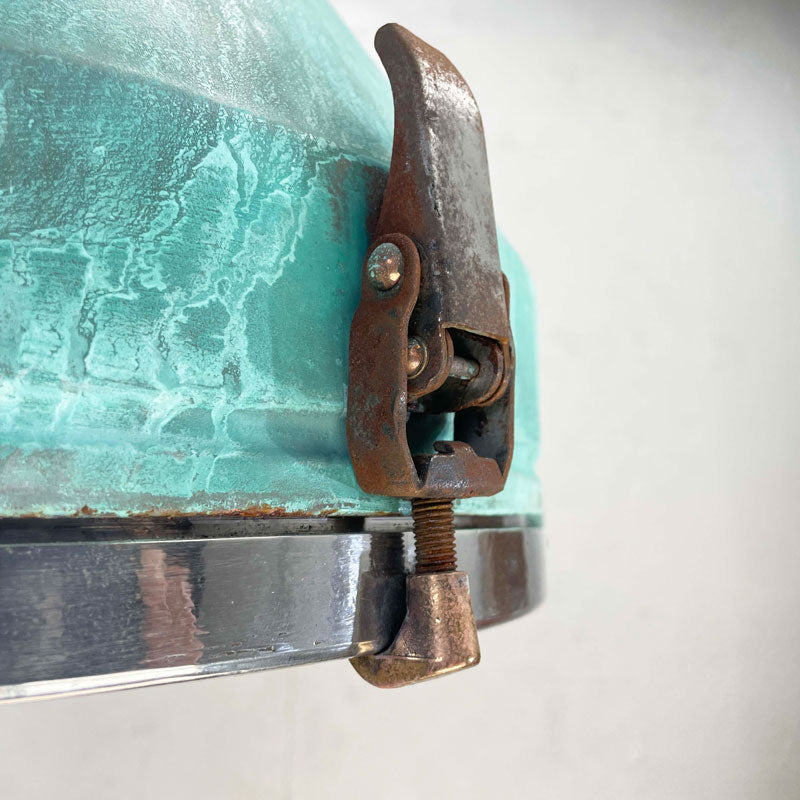 a vintage industrial bespoke verdigris pendant light by Loomlight. reclaimed and professionally refurbished. Unique vintage industrial lighting.