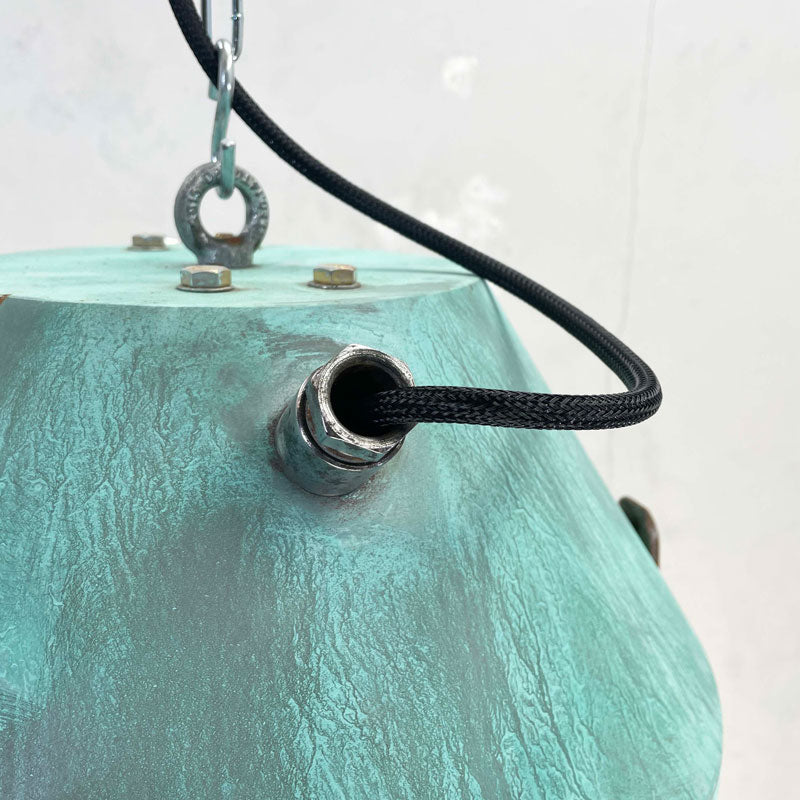 a vintage industrial bespoke verdigris pendant light by Loomlight. reclaimed and professionally refurbished. Unique vintage industrial lighting.