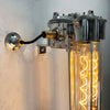 The Edison long wall light features 4 LED filament tubes. It is a reclaimed industrial fixture from 1976 which we have extensively restored and made ready for modern interiors. Made from Aluminium and glass