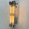 The Edison long wall light features 4 LED filament tubes. It is a reclaimed industrial fixture from 1976 which we have extensively restored and made ready for modern interiors. Made from Aluminium and glass
